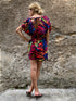 Tutina colorata con scollo